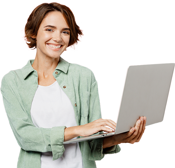 A smiling founder working on her laptop