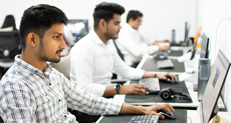 EPIC tech team working at their computers